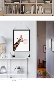 Detail of Nordic giraffe tapestry with hanging rope, black tassels, and pink bubble pattern