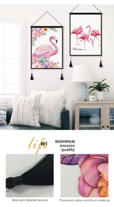 Close-up of thick cotton linen fabric with tassel detail and flamingo art wall hanging