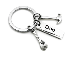Detailed view of stainless steel keychain with miniature tools and Dad ruler charm