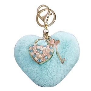 Tiffany blue heart faux fur keychain with gold clover and rhinestone heart charms