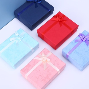 Cloud paper jewelry boxes with ribbon bows in navy, red, blue, pink, and purple colors
