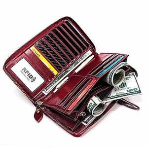 Detailed interior of wine red leather wallet showing RFID slots and card compartments