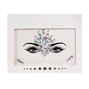 Macro detail of iridescent crystal face stickers for forehead and eye makeup application