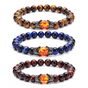 Natural tiger eye and volcanic stone bracelets featuring a black crown bead design