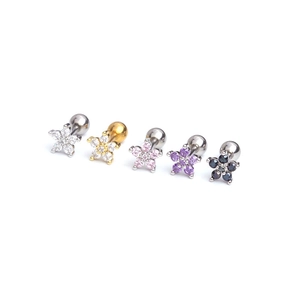Detail view of flower cartilage studs with colorful zirconia and screw backings