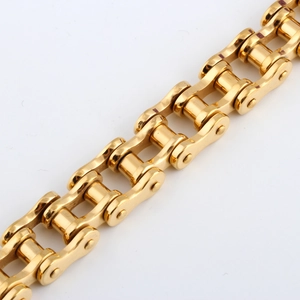 Detailed macro shot of a golden 12mm stainless steel bicycle chain bracelet design