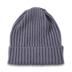 Detail of greyish purple ribbed knit beanie showing soft wool blend texture and folded cuff