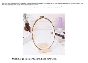 Detailed size display of oval lace jewelry holder with pearl trim and wooden base stand
