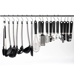 Stainless steel kitchen hooks set with black heat-resistant utensils on hanging rack