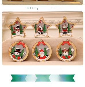 Detail show of wooden Christmas ornaments featuring Santa, snowman and reindeer designs