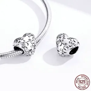 Vintage heart charm in S925 sterling silver with vine patterns and sparkling zircons