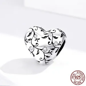 S925 sterling silver heart bead with vintage vine patterns and clear zircon accents