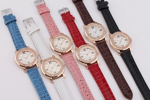 Detail of six quartz watches featuring Roman numerals, rhinestone bezels, and leather straps