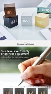 Dettaglio dei quattro livelli di luminosità LED sulla sveglia digitale quadrata in legno
