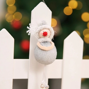 Sparkly silver Christmas snowman doll with red nose and small bells for festive desktop decor