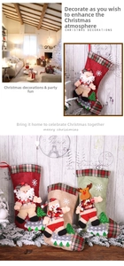 Detailed view of large burlap Christmas stockings with 3D Santa and Reindeer appliques