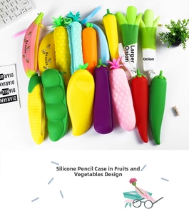 Flat lay of creative silicone fruit and vegetable pencil cases with smooth zippers