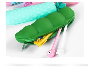 Detail showing creative green pea pod silicone pencil case with zipper closure and pens