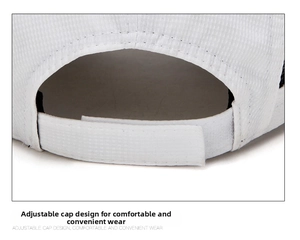 Detail of adjustable velcro closure on white breathable mesh foldable baseball cap
