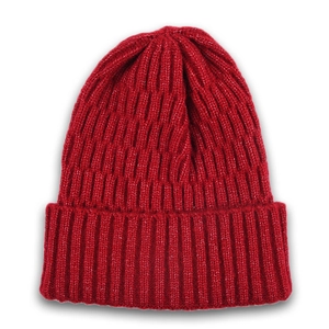 Close-up of deep red knitted beanie featuring thick vertical ribbing and folded cuff