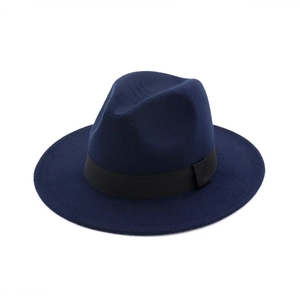 Detail view of navy blue wool fedora hat texture with a classic black decorative ribbon
