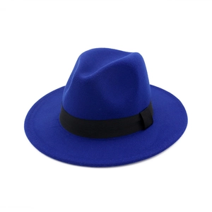 Close-up of the elegant blue wool fedora hat featuring a classic black ribbon band