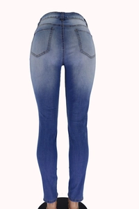 Rear view of slim fit high waist jeans with back pockets and blue gradient wash effect