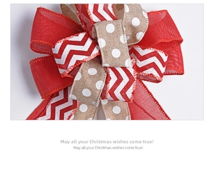 Detailed view of layered burlap Christmas bow with red and white festive ribbon patterns