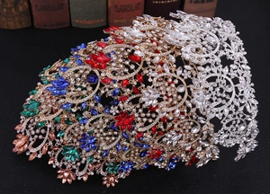 Macro shot of luxury Baroque bridal crown with colorful gems and sparkling rhinestones