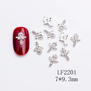 Silver alloy nail art charms featuring angel cross designs with high-gloss white rhinestones