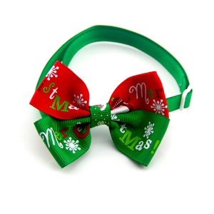 Christmas pet bowtie with Merry Christmas snowflake print and adjustable white buckle