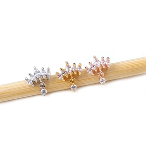 Elegant crown shaped helix earrings in silver gold and rose gold with marquise crystals