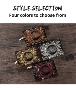 Detailed view of A5 vintage embossed notebooks in four metallic colors on wood background