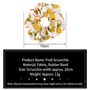Yellow pineapple print fabric scrunchie with 10cm diameter and elastic hair tie band