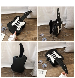 Detail view of guitar shaped crossbody bag with star rivets and metal chain strap