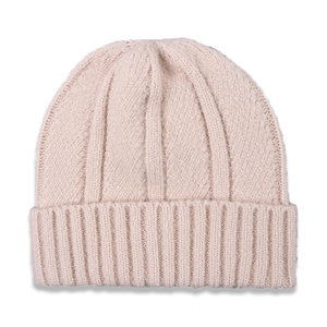 Detailed view of cream knit beanie featuring thick vertical ribbed texture and folded cuff