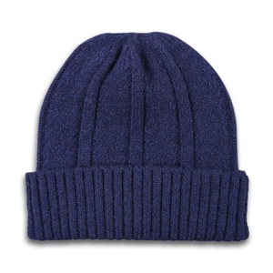 Detailed view of dark blue ribbed knit beanie showing thick wool texture and folded cuff