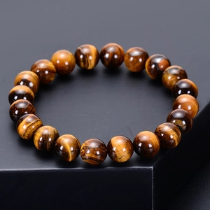Natural yellow tiger eye stone beaded bracelet with glossy polished texture and round beads