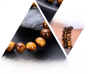 Macro shot of natural tiger eye stone beads bracelet with smooth polished textures