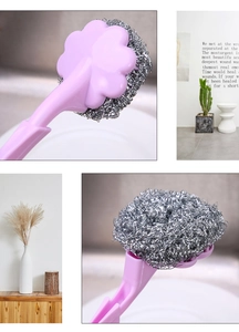 Close-up of pink flower-shaped handle and stainless steel wire mesh dish cleaning brush