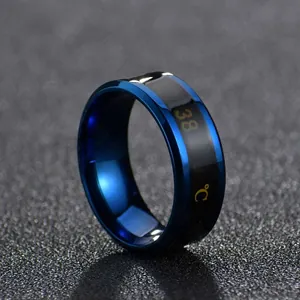 Macro shot of smart stainless steel temperature sensing ring showing 38°C on black display