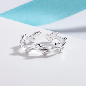 Elegant silver olive leaf open adjustable ring featuring a polished nature inspired design