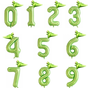 Green foil number balloons from zero to nine with 3D cartoon dinosaur topper for kids party