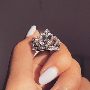 Classic rose gold crown ring with micro-pave diamonds and heart-shaped cutout design