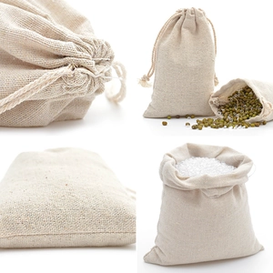 Natural linen drawstring pouch set for storage and blank gift packaging on white background