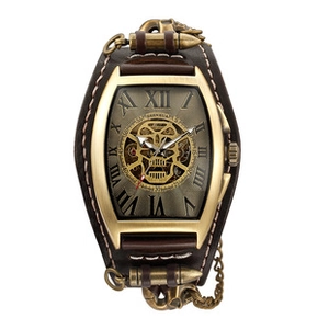 Detail of bronze steampunk skeleton watch with wide leather strap and bullet accents