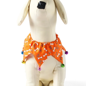 Detail of Halloween pet collar with orange fabric, colorful bells, and Trick or Treat print