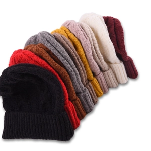 Chunky cable knit winter beanies for women in eight colors with wide rolled cuffs
