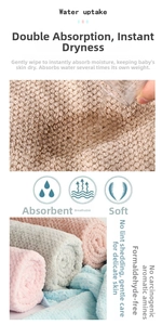 Close-up of quick-dry coral fleece towels showing superior water absorption and soft texture