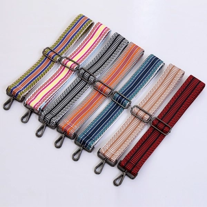 Adjustable woven shoulder straps with colorful geometric patterns and metal hooks